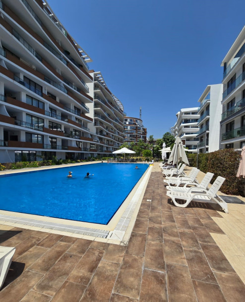 GİRNE/MERKEZDE HAVUZLU SİTEDE SATILIK 2+1 DAİRE-2