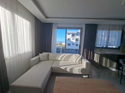 GİRNE/ALSANCAK’TA ALPARK SİTESİNDE KİRALIK 2+1 DENİZ MANZARALI DAİRE