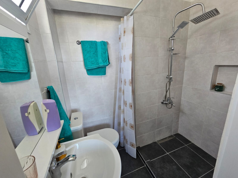 GİRNE/ÇATALKÖY'DE ORTAK HAVUZLU SİTE İÇERİSİNDE KİRALIK 2+1 EŞYALI DAİRE-14