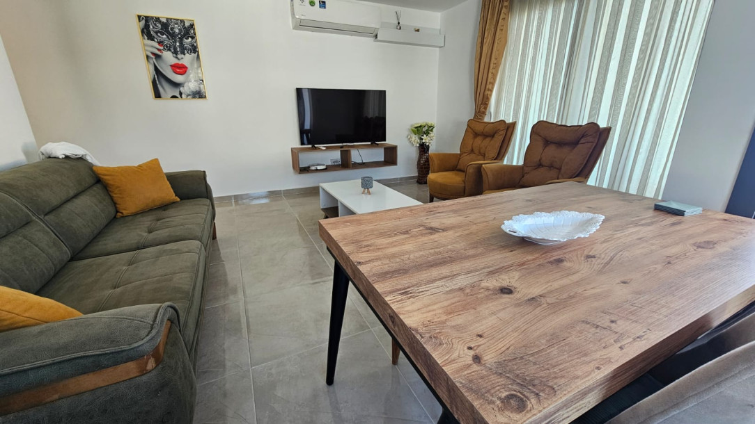 GİRNE/ ALSANCAK ATAKARA BÖLGESİ | HAVUZLU SİTEDE SATILIK 2+1 DAİRE-1