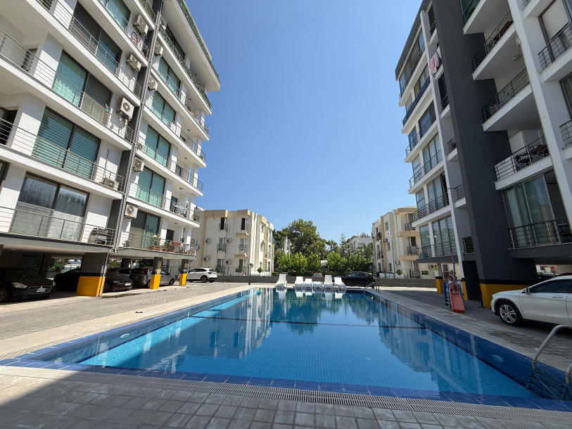 GİRNE MERKEZ ÖĞRETMENLER EVİ BÖLGESİNDE HAVUZLU SİTEDE KİRALIK 2+1 EŞYALI DAİRE-10