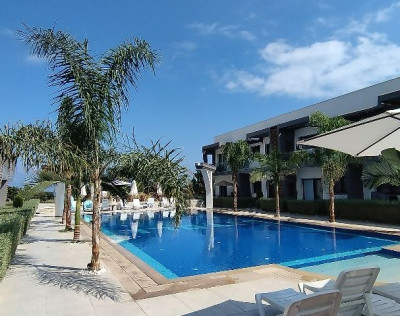 GİRNE/ALSANCAK'TA SATILIK SİTE İÇERİSİNDE 1+1 DAİRE