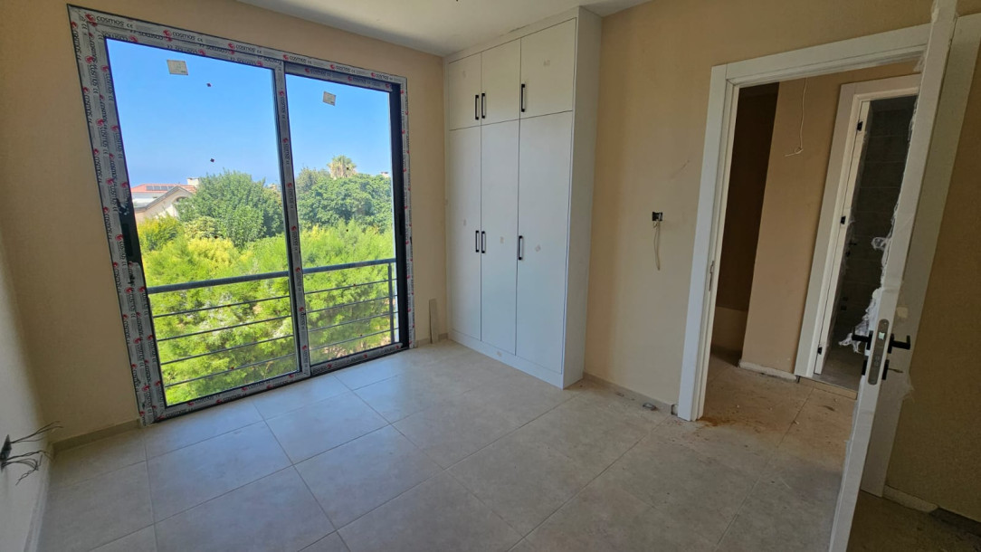 GİRNE KARŞIYAKA'DA SATILIK SIFIR 2+1 VİLLA-13