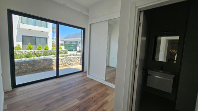 GİRNE/KARŞIYAKA AQUALINA RESIDENCE’TA SATILIK BAHÇELİ 2+1 LÜKS DAİRE | RESORT YAŞAM-11