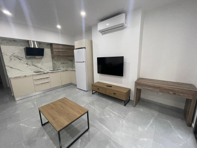 GİRNE / OZANKÖY’DE HAVUZLU RESIDENCE’TA KİRALIK 1+1 DAİRE
