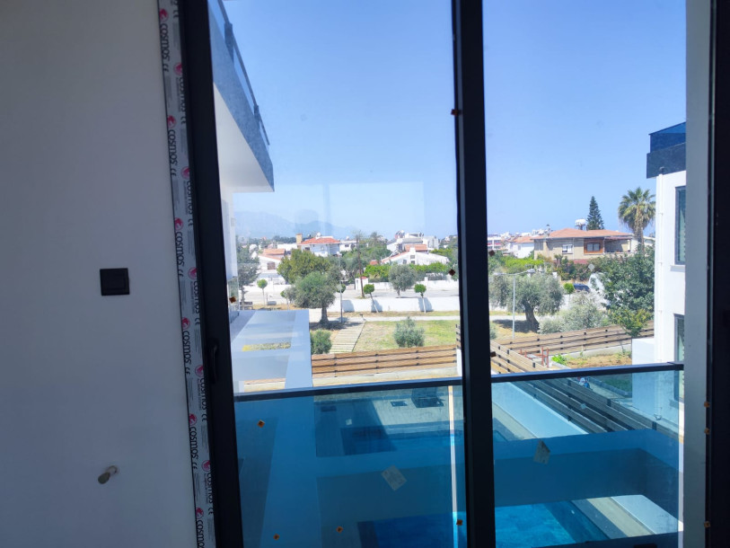 GİRNE OZANKÖY ERDENER MARKET BÖLGESİ SATILIK 4+1 LÜKS VİLLA-32