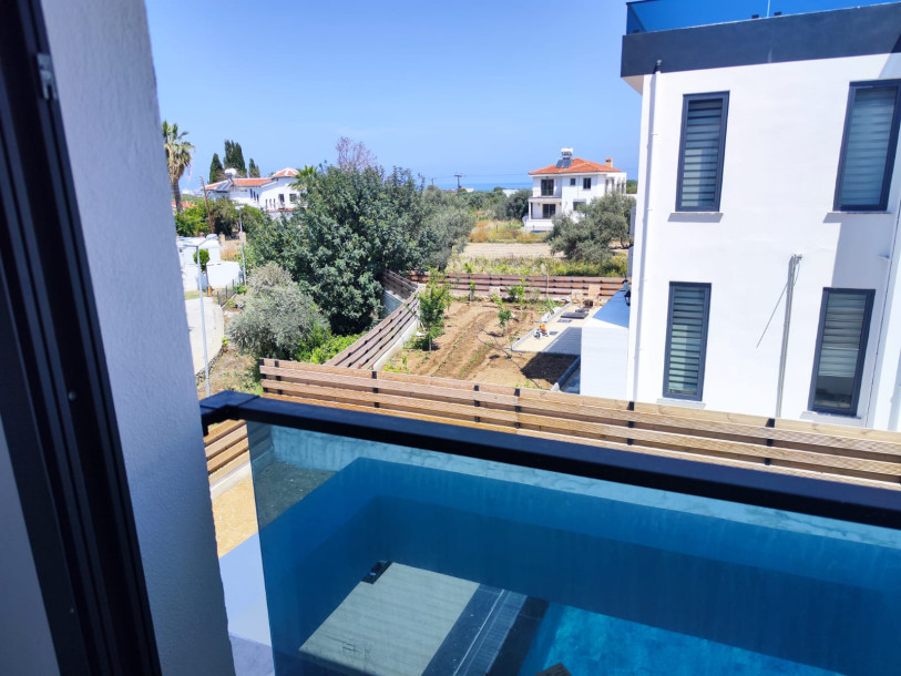 GİRNE OZANKÖY ERDENER MARKET BÖLGESİ SATILIK 4+1 LÜKS VİLLA-29